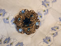 Vintage Czech Gold-Tone Filigree Brooch with Blue Rhinestones
