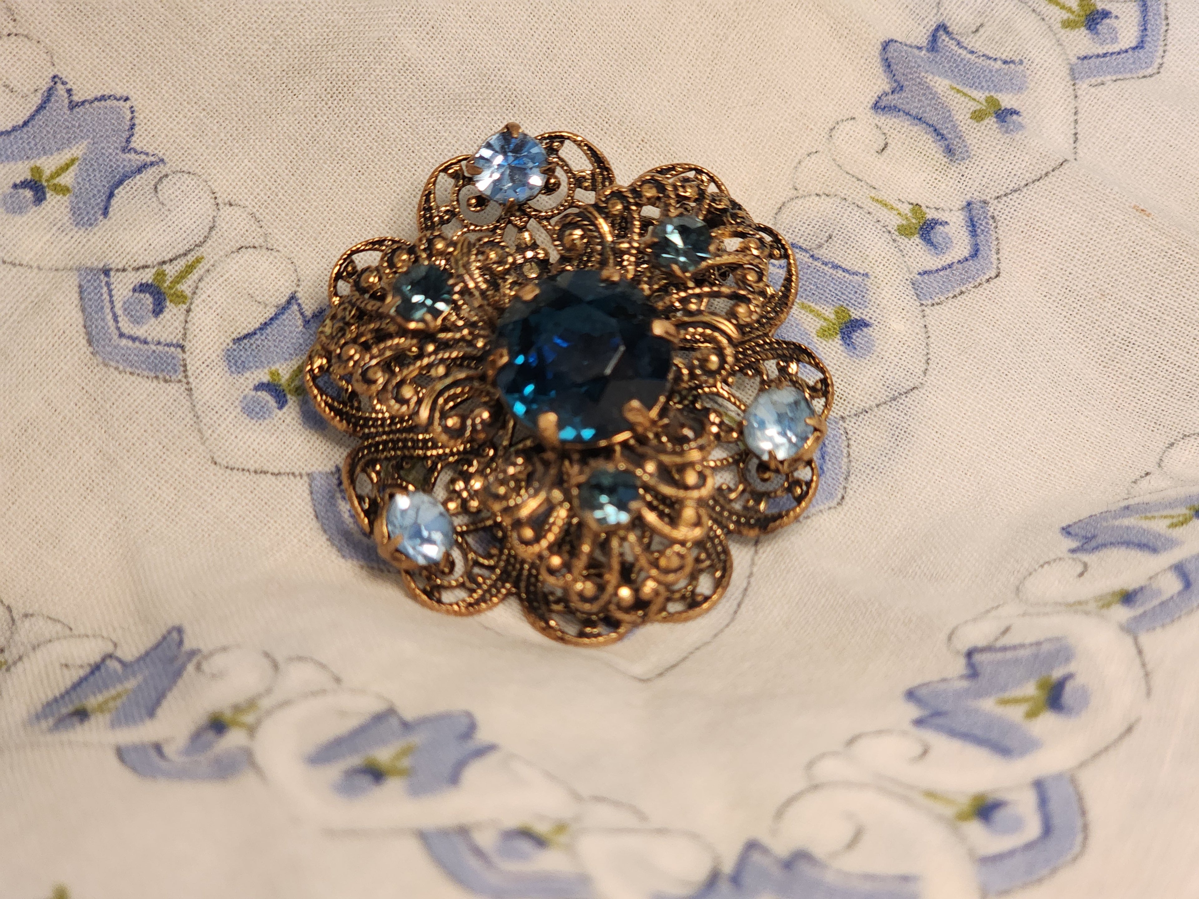 Vintage Czech Gold-Tone Filigree Brooch with Blue Rhinestones